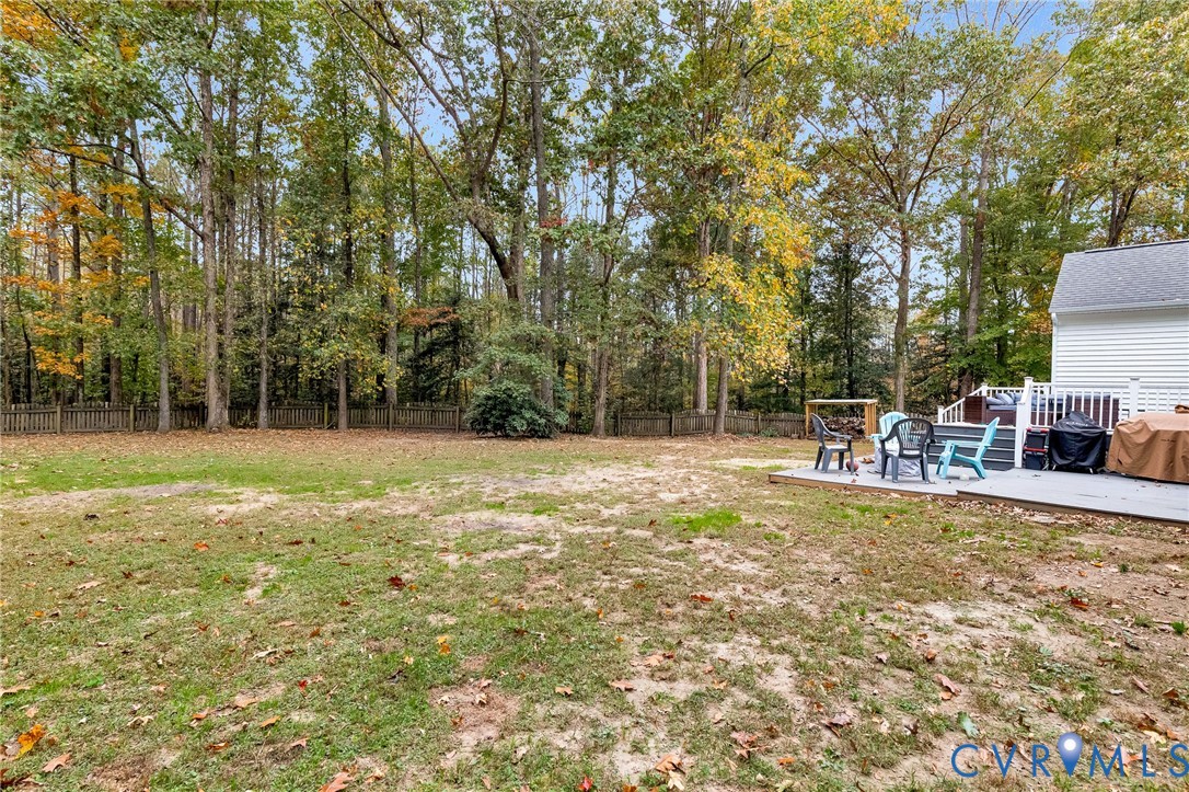 109 Pleasant Grove Court Aylett, VA 23009 - Photo 38 of 39 a view of a house with backyard and a tree