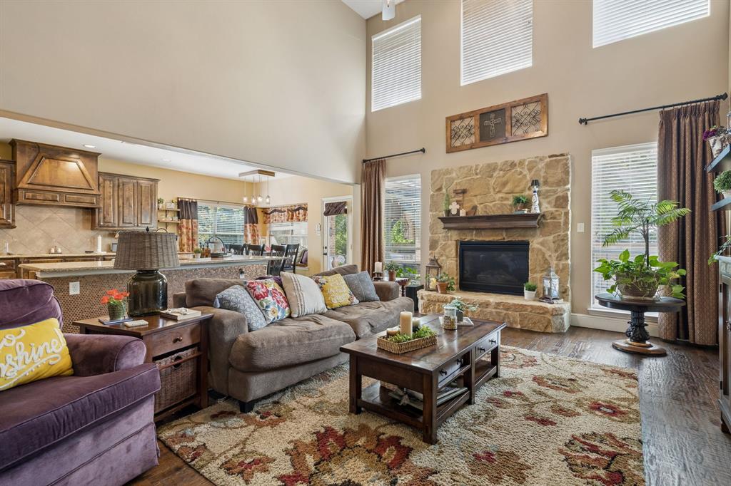 8104 Red Riv Run North Richland Hills, TX 76180 - Photo 11 of 38 a living room with furniture or couch and a fireplace