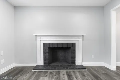 a living room with a fireplace