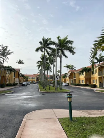 a street sign on a side of building