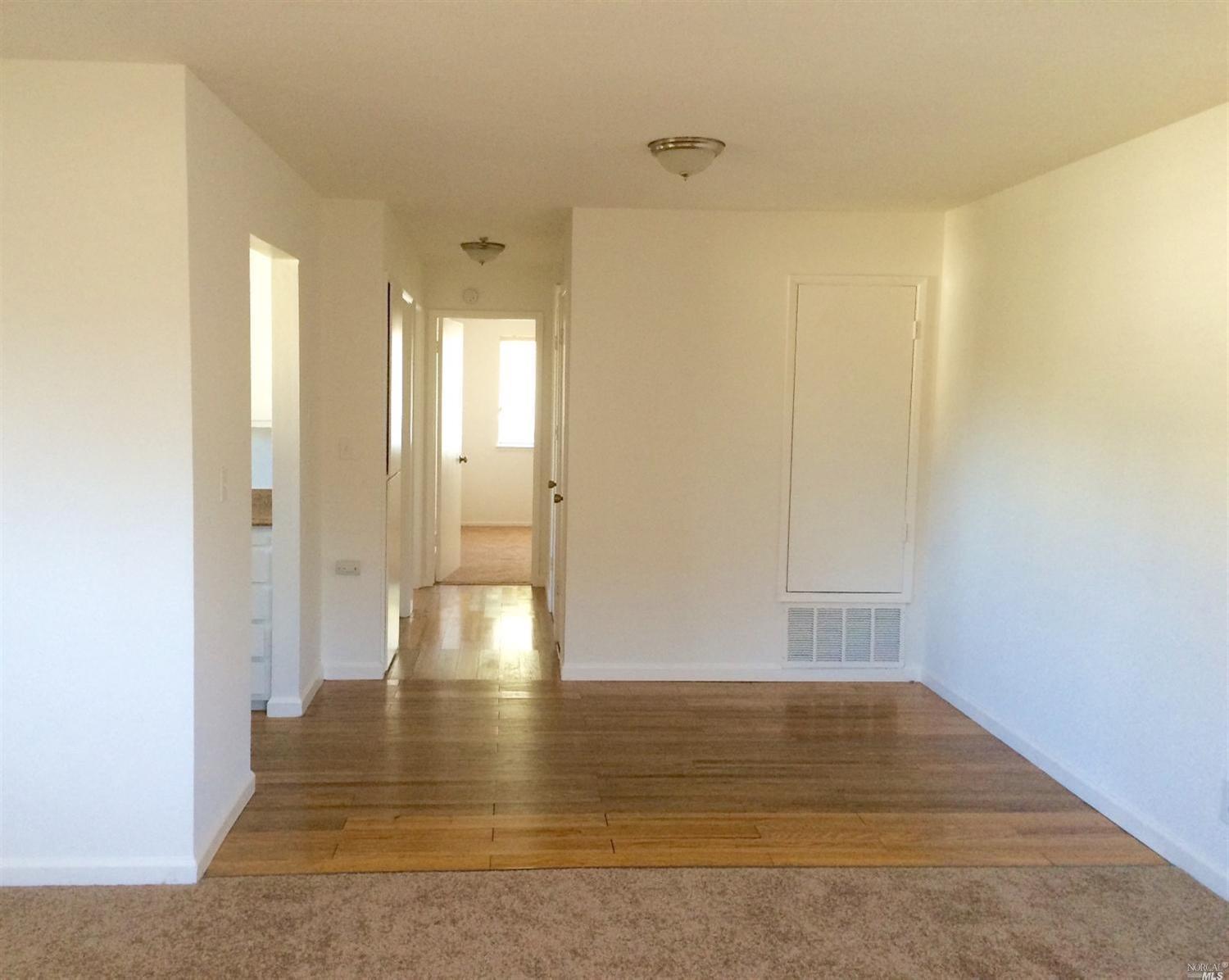 2516 Coffey Lane Santa Rosa, CA 95403 - Photo 1 of 1 Open space from living room to dining room. New carpets, paint, ceiling fixtures.
