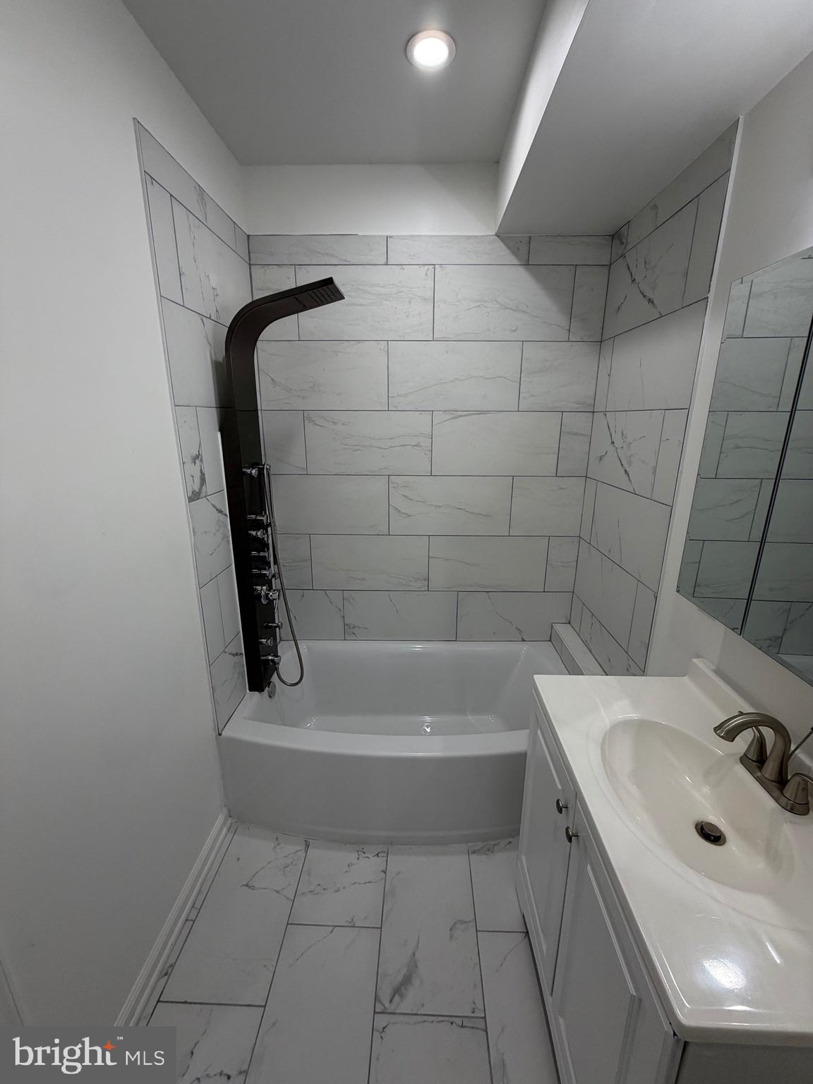 2218 Master Street Philadelphia, PA 19121 - Photo 14 of 66 a bathroom with a sink a toilet and bathtub