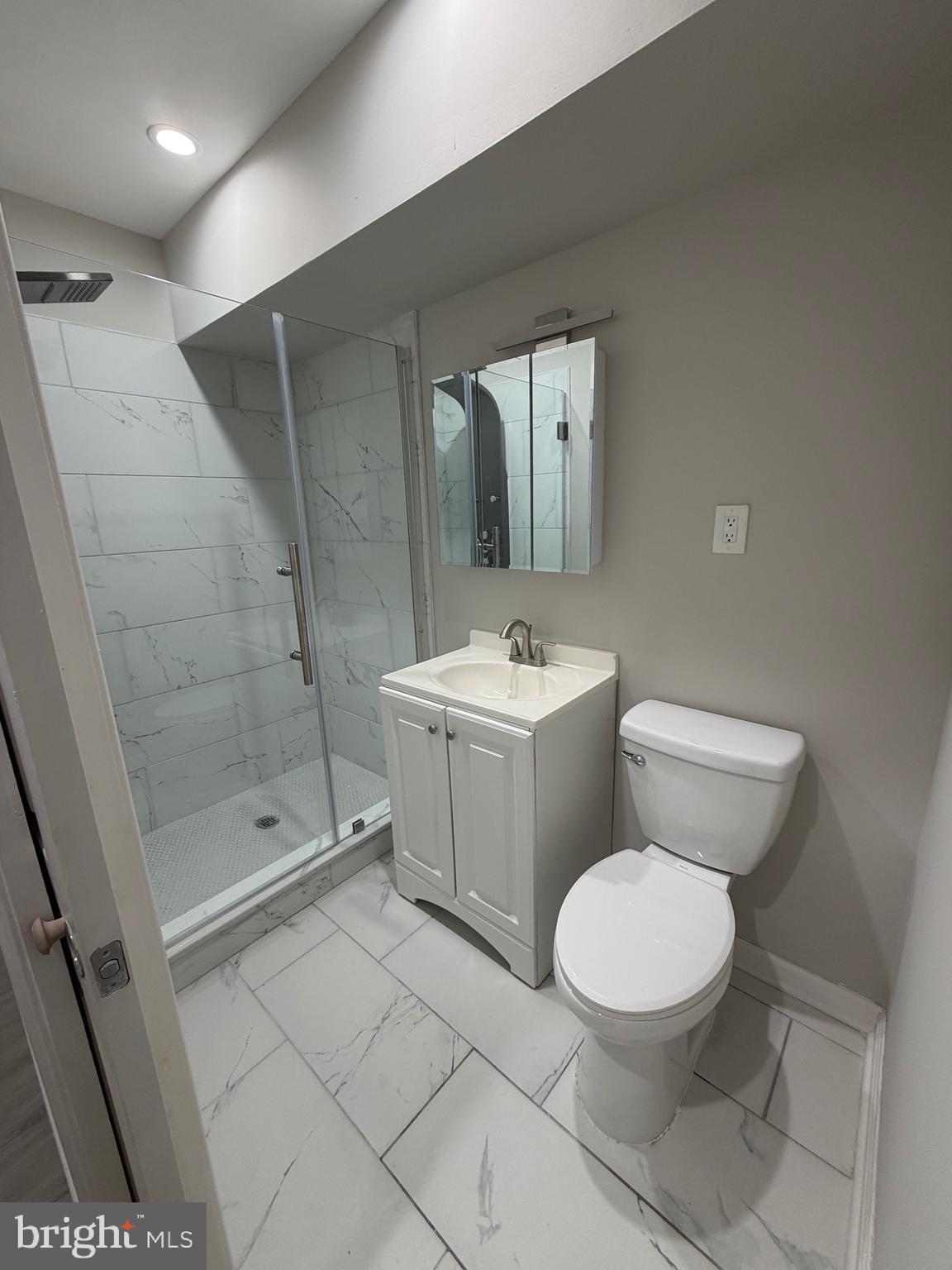 2218 Master Street Philadelphia, PA 19121 - Photo 25 of 66 a white toilet sitting next to a bathroom sink