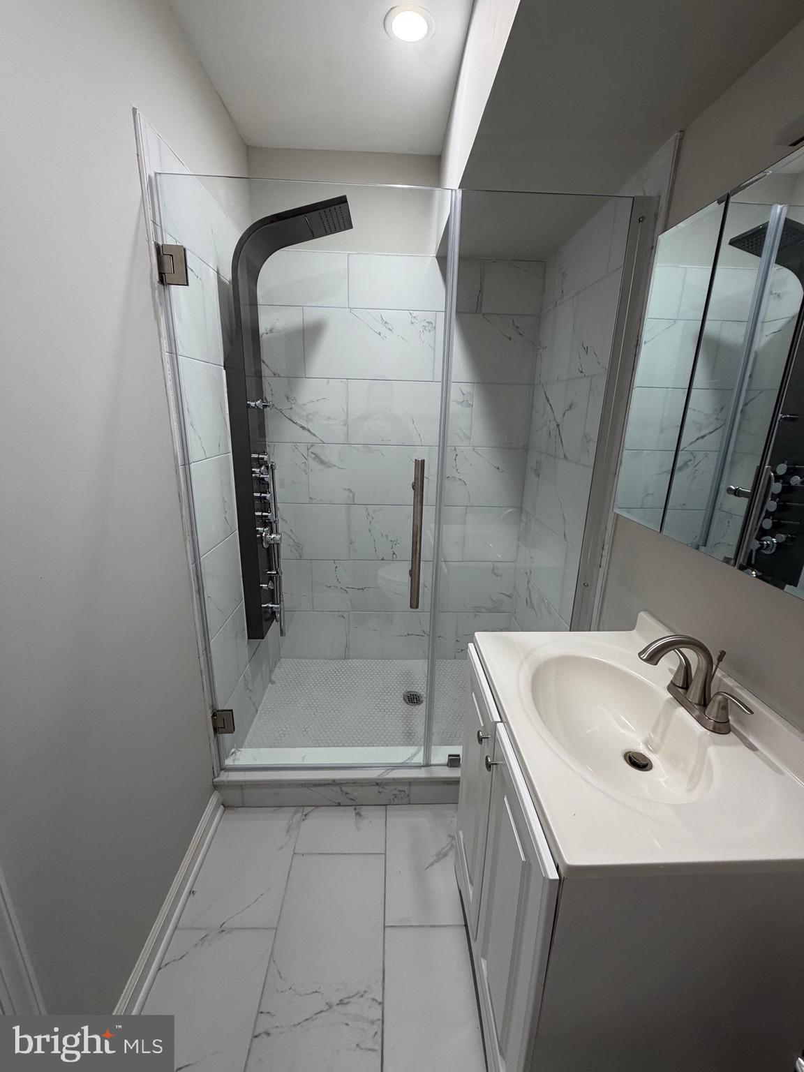 2218 Master Street Philadelphia, PA 19121 - Photo 26 of 66 a bathroom with a sink a toilet and shower