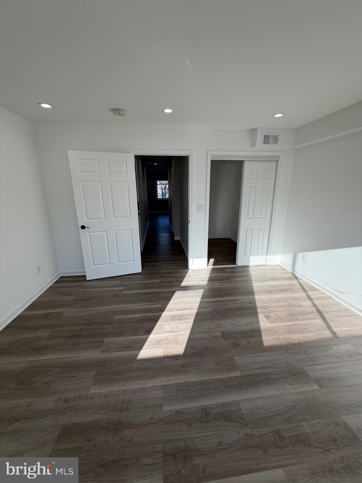 2218 Master Street Philadelphia, PA 19121 - Photo 36 of 66 a view of a hallway with wooden floor