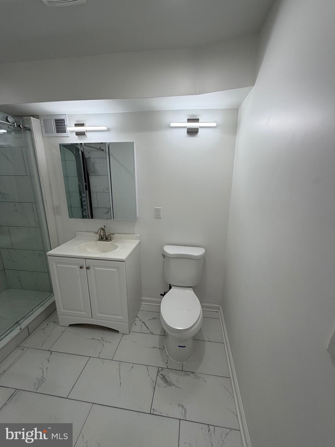 2218 Master Street Philadelphia, PA 19121 - Photo 39 of 66 a bathroom with a sink toilet and shower