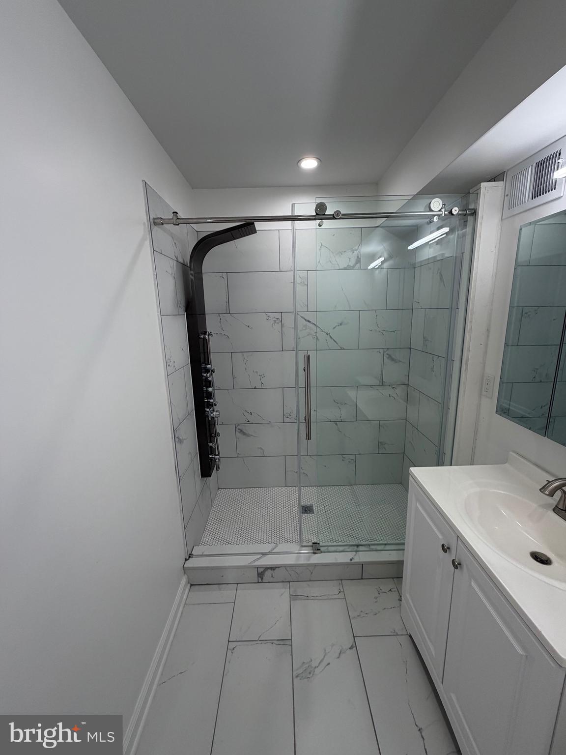 2218 Master Street Philadelphia, PA 19121 - Photo 40 of 66 a bathroom with a shower and a sink