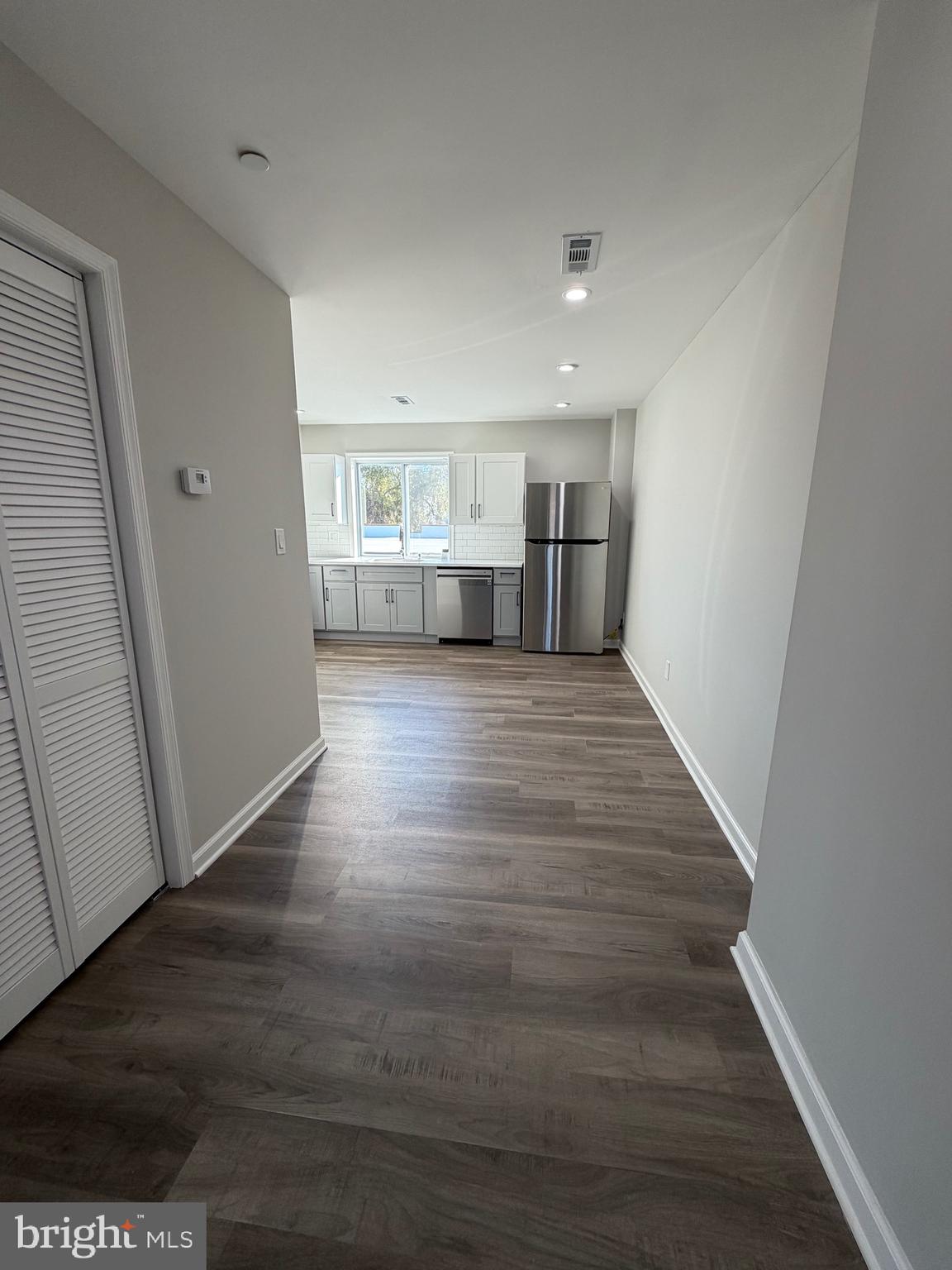 2218 Master Street Philadelphia, PA 19121 - Photo 46 of 66 a view of a kitchen with wooden floor and a window