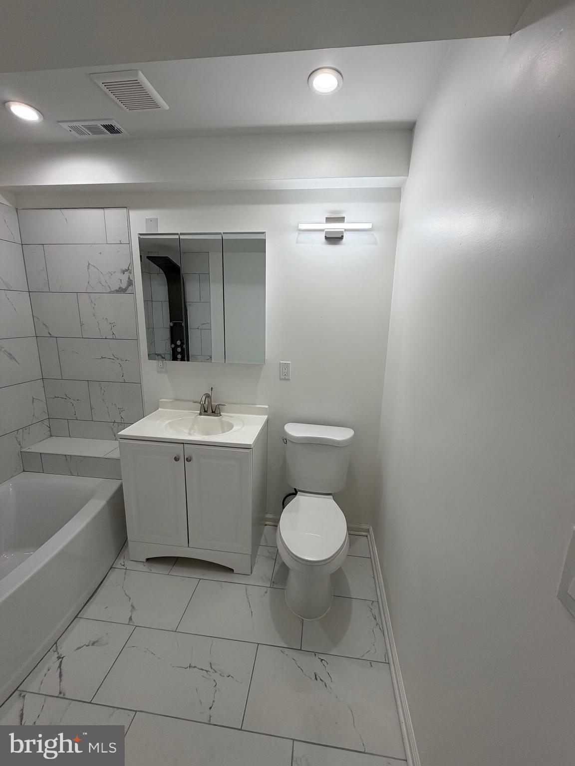 2218 Master Street Philadelphia, PA 19121 - Photo 53 of 66 a bathroom with a sink toilet and shower