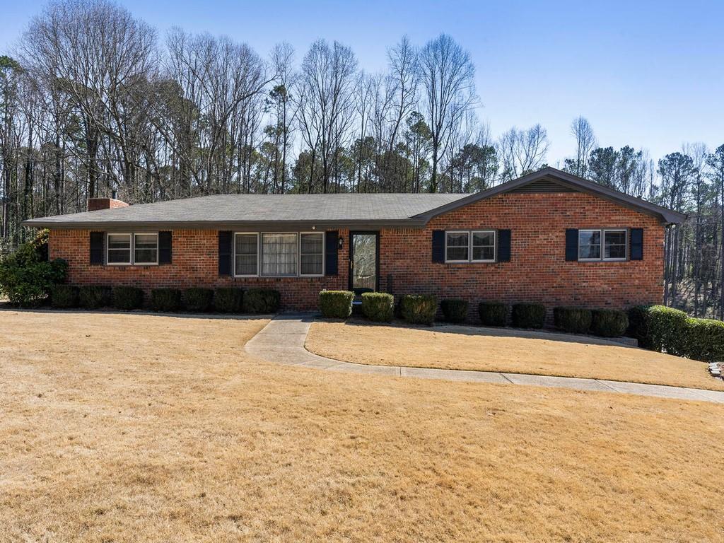 3370 Shaw Road Marietta, GA 30066 - Photo 1 of 1 Four sided brick ranch.