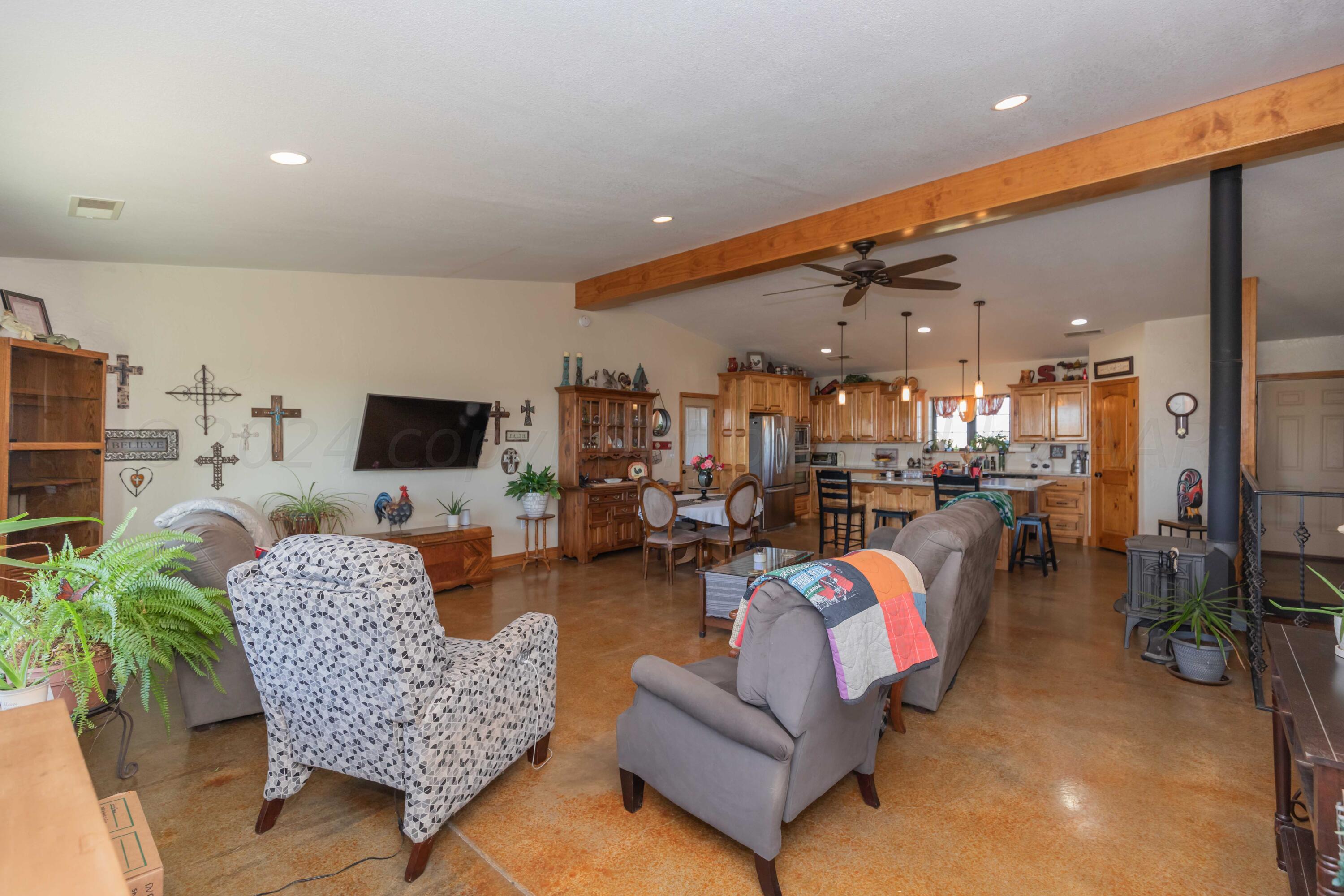 6700 West Dowlen Road Happy, TX 79042 - Photo 5 of 58 LIVING ROOM VIEW 1
