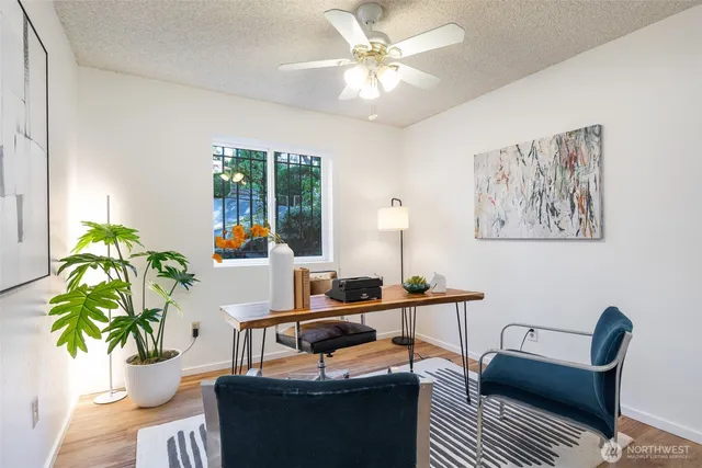 a view of a workspace with furniture