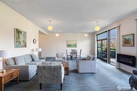 a kitchen with a sink a stove and cabinets