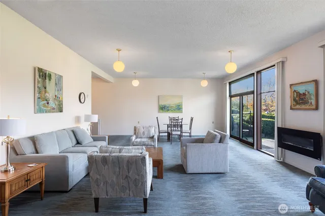a kitchen with a sink a stove and cabinets