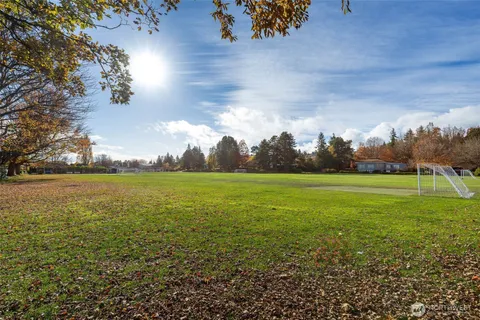 an aerial view of a house with a garden