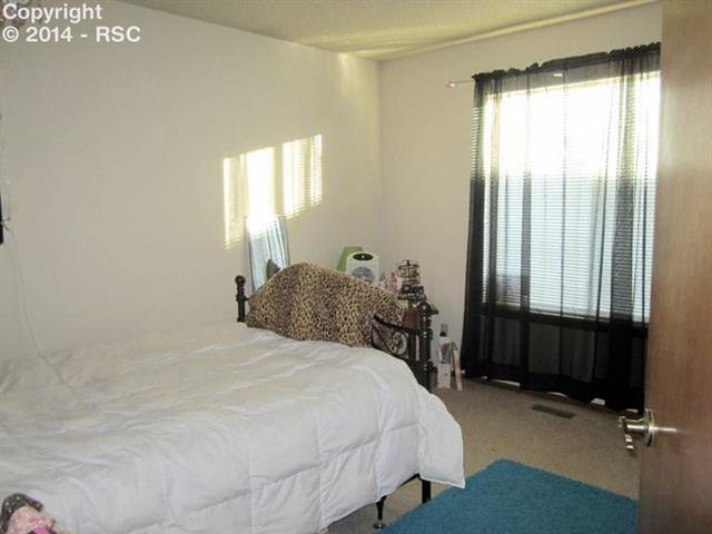 78 Rising Sun Terrace Colorado Springs, CO 80921 - Photo 7 of 8 2nd main level bedroom.