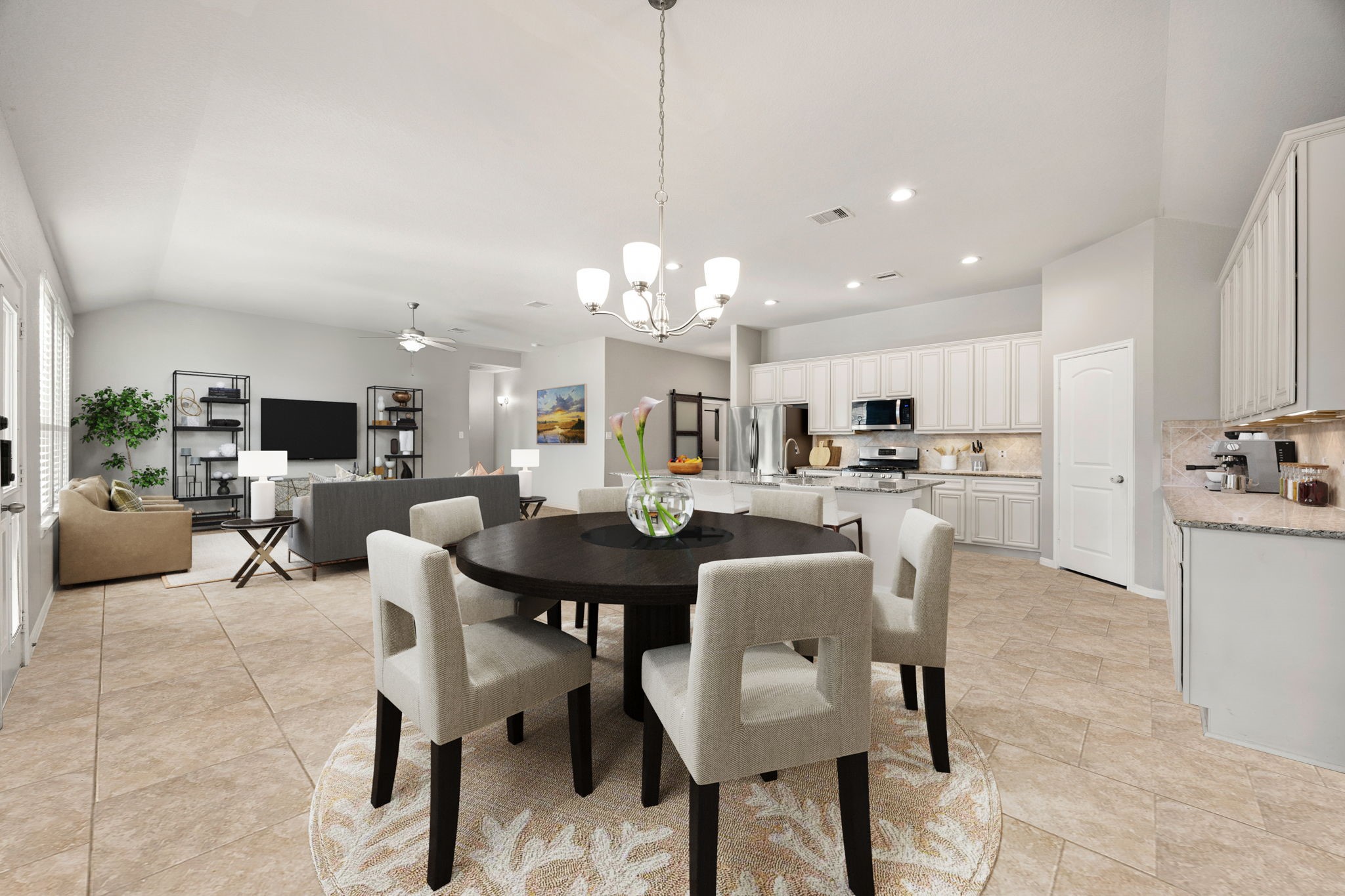 14023 Beaverhead Range Court Conroe, TX 77384 - Photo 10 of 29 Gather around in this elegant and centrally located dining space, perfect for both intimate dinners and lively gatherings. A beautiful chandelier hangs overhead, providing both ample light and a touch of refinement on meal times. *Virtually Staged