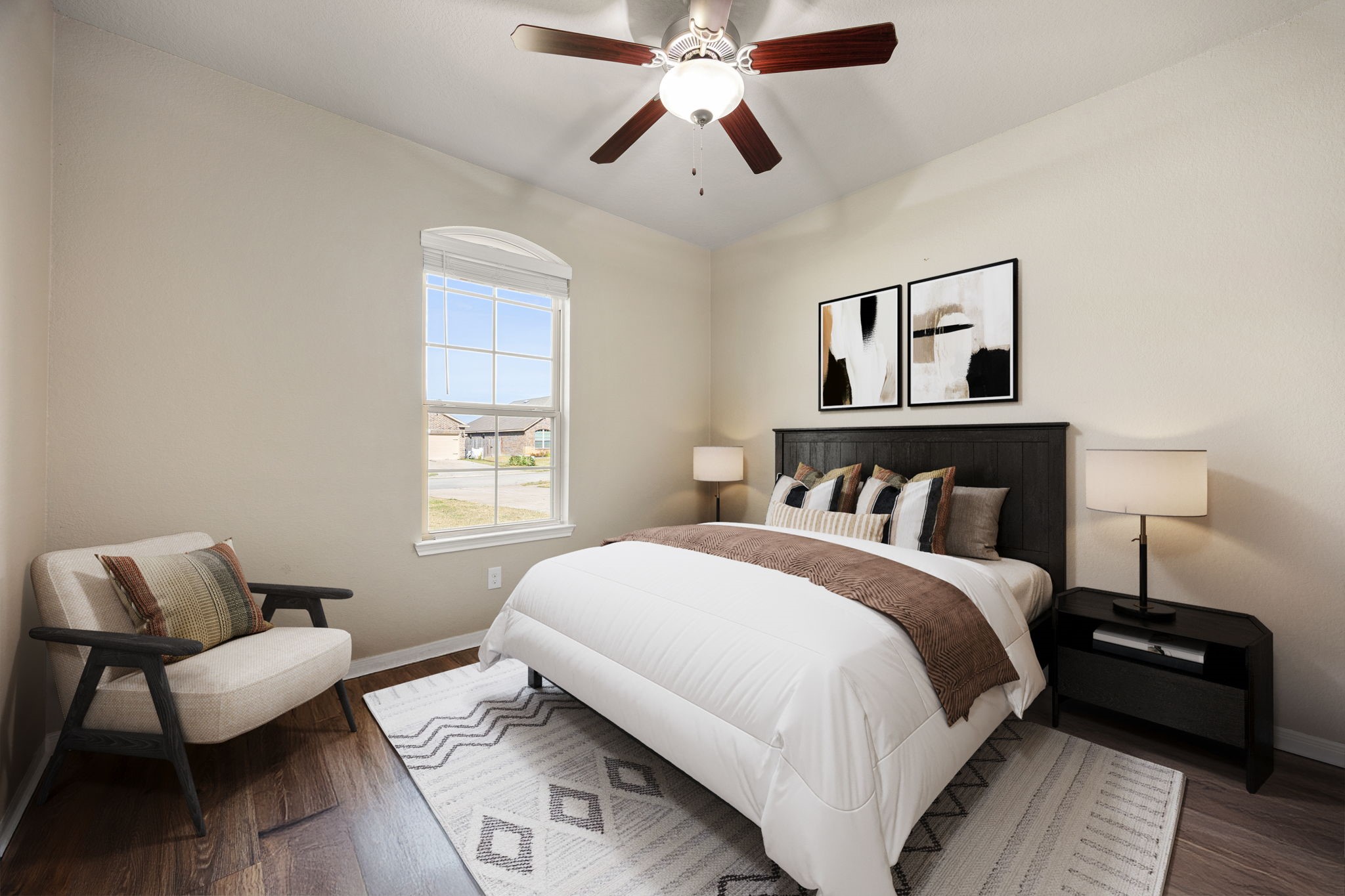 14023 Beaverhead Range Court Conroe, TX 77384 - Photo 16 of 29 A bright and versatile secondary bedroom that offers comfort, style, and flexibility for guests, family members, or even a quiet home office retreat. Featuring ceiling fan, wood flooring, and a large window! *Virtually Staged