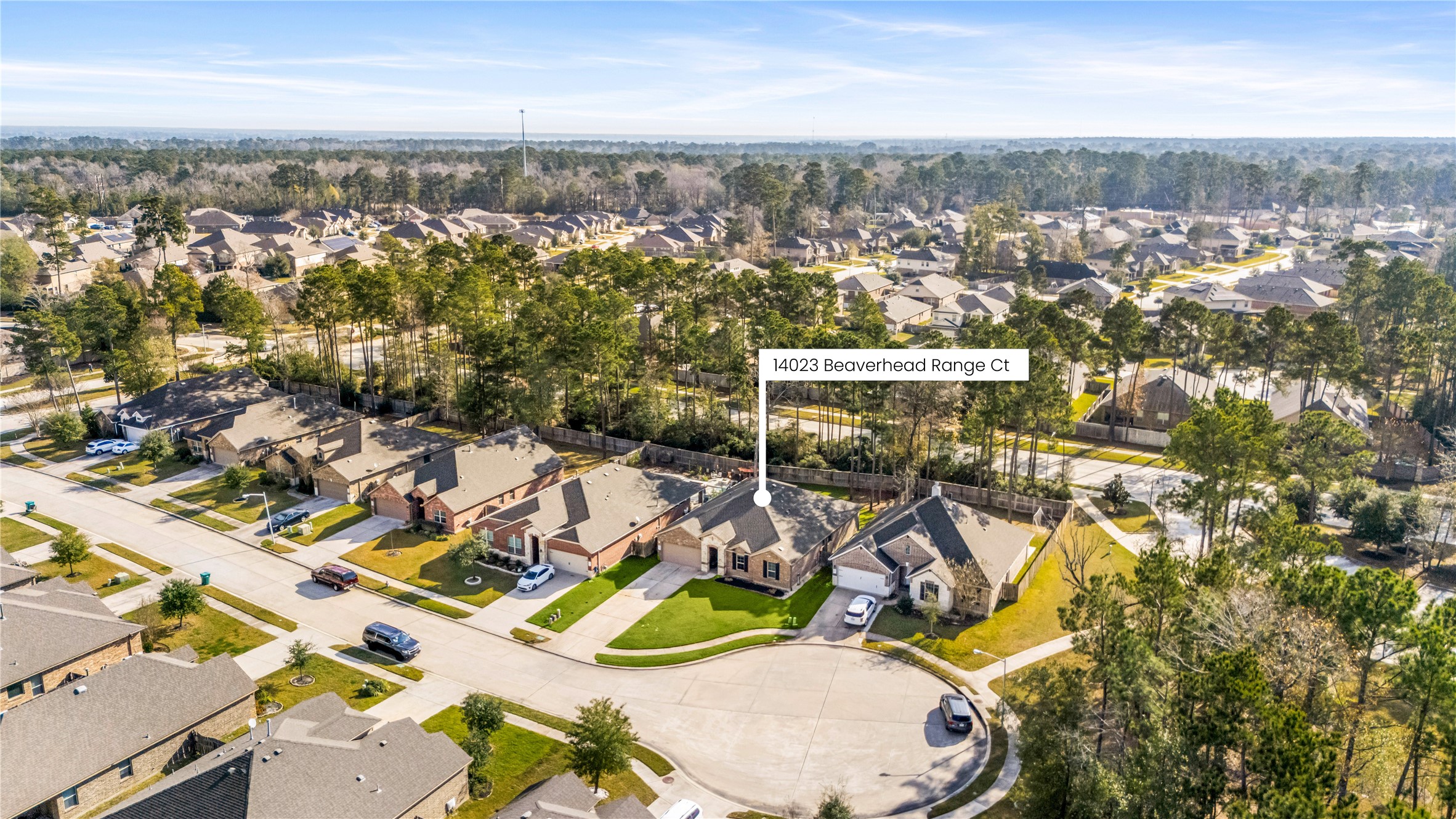 14023 Beaverhead Range Court Conroe, TX 77384 - Photo 25 of 29 14023 Beaverhead Range Court is located on a quiet cul-de-sac lot with NO BACK NEIGHBORS, and just steps from the community pool and rec center, accessible at the end of the cul-de-sac. The neighborhood is surrounded by piney woods and close to the W.G. Jones State Forest, offering ample opportunity for outdoor activities and a quiet, peaceful environment.