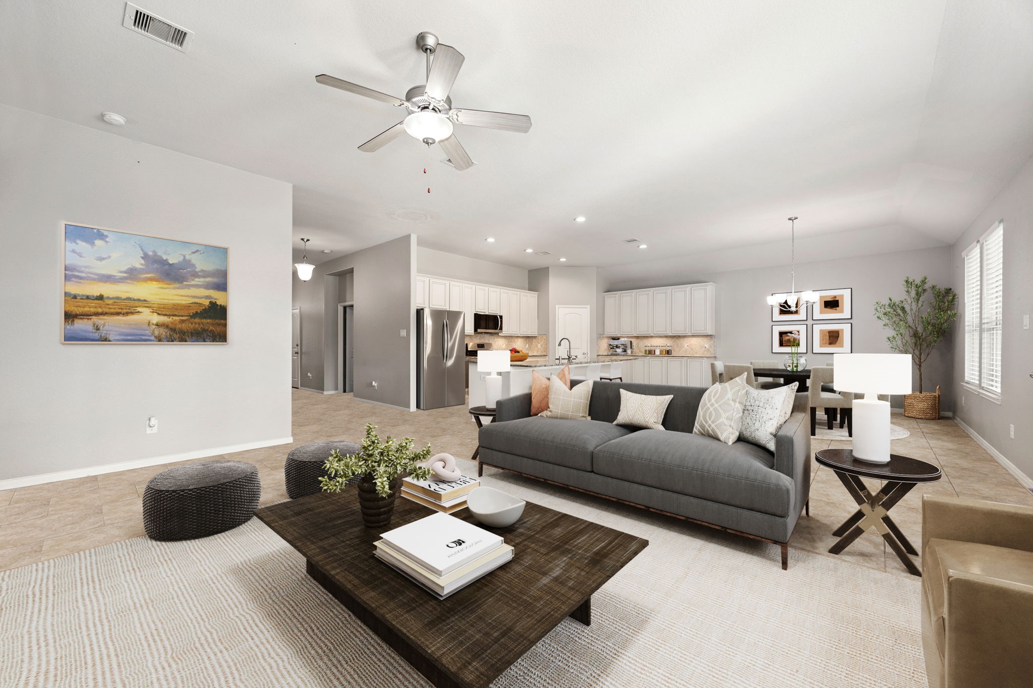 14023 Beaverhead Range Court Conroe, TX 77384 - Photo 4 of 29 This inviting space flows seamlessly from the comfortable living area into a dedicated dining space and a bright, well-appointed kitchen. The generous layout is ideal for both quiet family evenings and entertaining guests, promoting easy conversation and natural movement throughout the home. Neutral tones and abundant natural light create a warm and welcoming atmosphere. *Virtually Staged