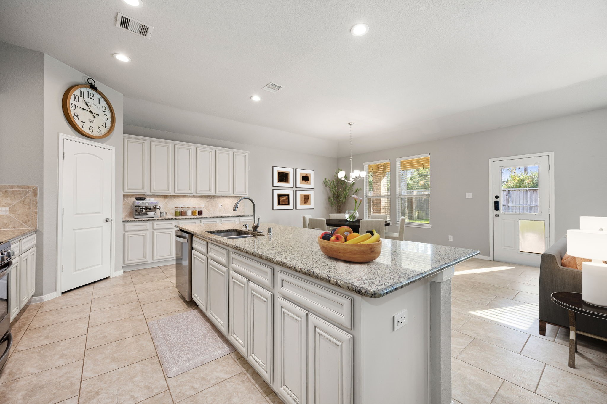 14023 Beaverhead Range Court Conroe, TX 77384 - Photo 8 of 29 The well-appointed kitchen features a wealth of stylish and functional storage options! With floor-to-ceiling cabinetry ensures plenty of room for all your culinary essentials, keeping countertops clutter-free. *Virtually Staged