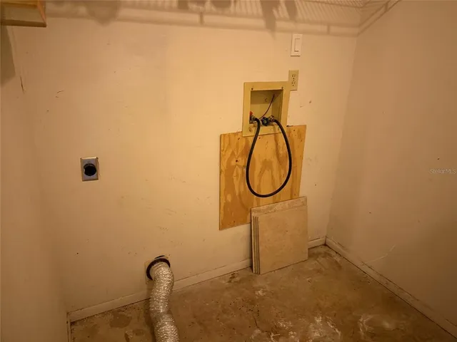 a view of outdoor space with wooden fence