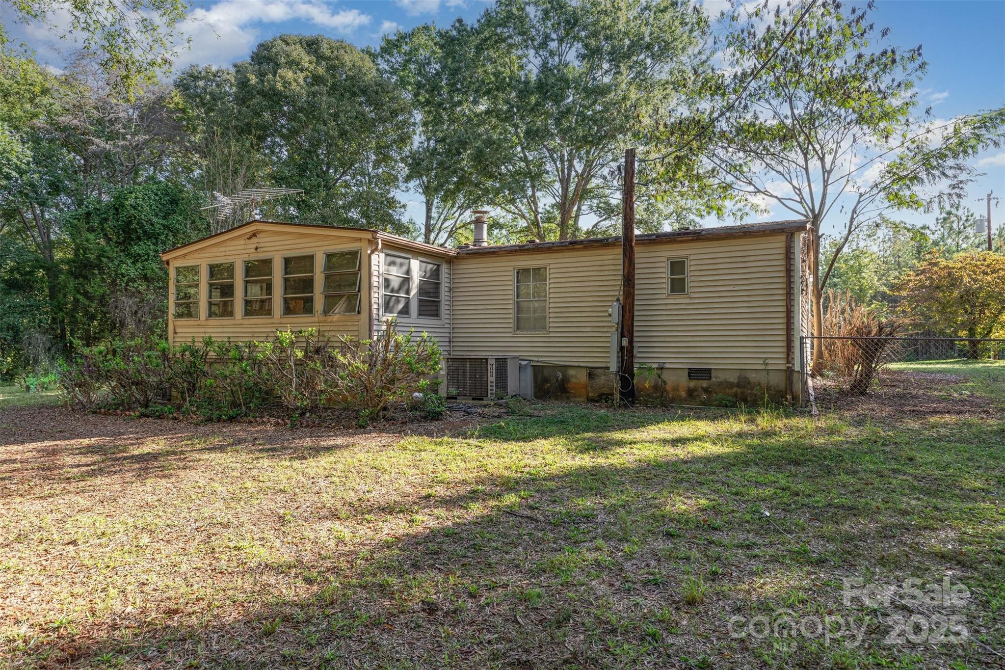 11500 Beagle Street Midland, NC 28107 - Photo 2 of 15 a view of a house with a yard