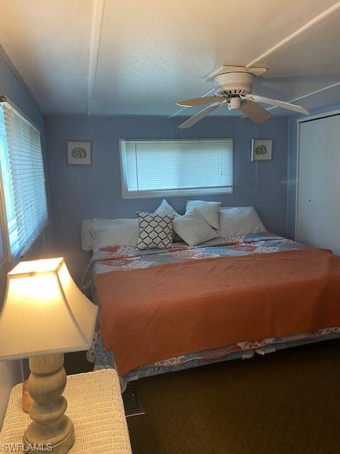 137 Rookery Road Naples, FL 34114 - Photo 14 of 23 a bedroom with a bed and window