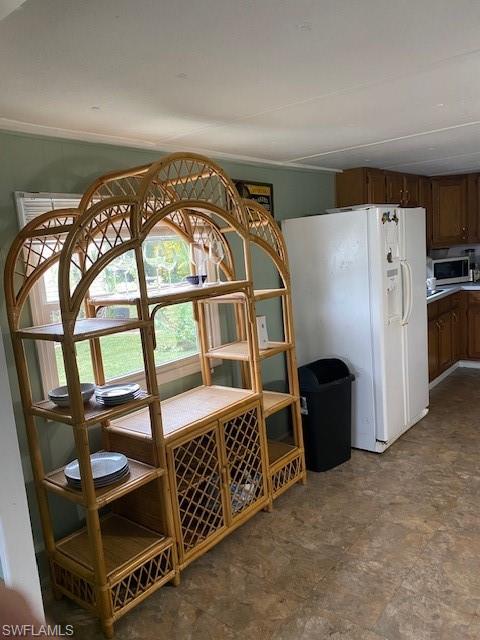 137 Rookery Road Naples, FL 34114 - Photo 6 of 23 an empty room with windows and wardrobe