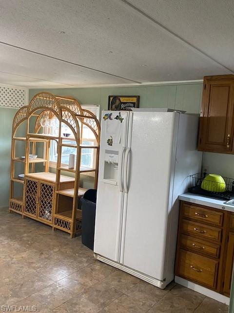 137 Rookery Road Naples, FL 34114 - Photo 10 of 23 a view of walk in closet with clothes and shoes