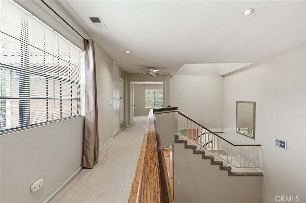 919 Auburn Road San Dimas, CA 91773 - Photo 20 of 52 Upstairs hallway leading to double door entry to master bedroom