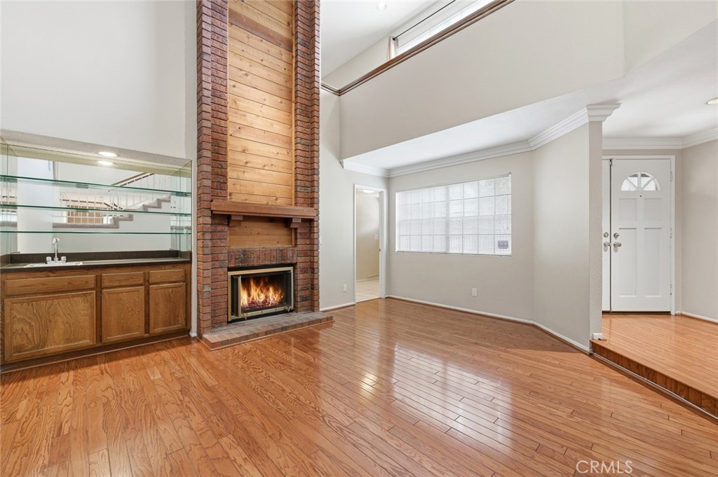 919 Auburn Road San Dimas, CA 91773 - Photo 8 of 52 Livingroom and front doors to the right