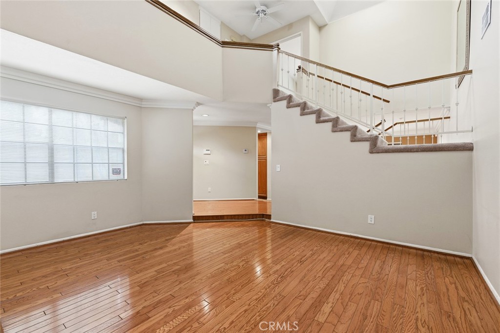 919 Auburn Road San Dimas, CA 91773 - Photo 52 of 52 Looking outward from living room. Notice the open floorplan, soaring ceilings and beautiful floors.