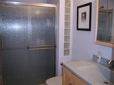 4352 Goodson Way Rohnert Park, CA 94928 - Photo 8 of 9 a bathroom with a sink and mirror with toilet
