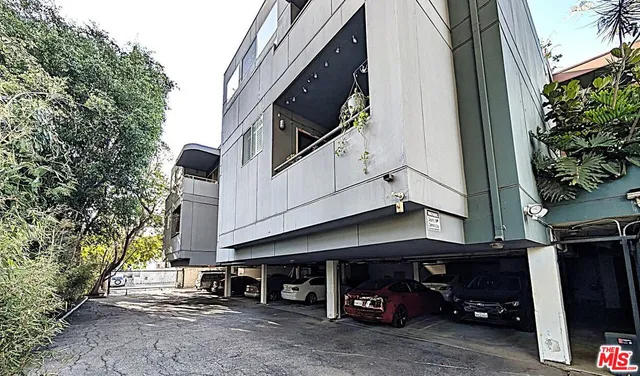 a car parked in front of a building