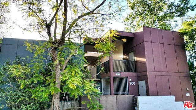 front view of a house with a small yard