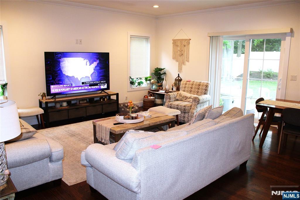 294-296 Tenafly Road Tenafly, NJ 07670 - Photo 6 of 24 a living room with furniture and a flat screen tv