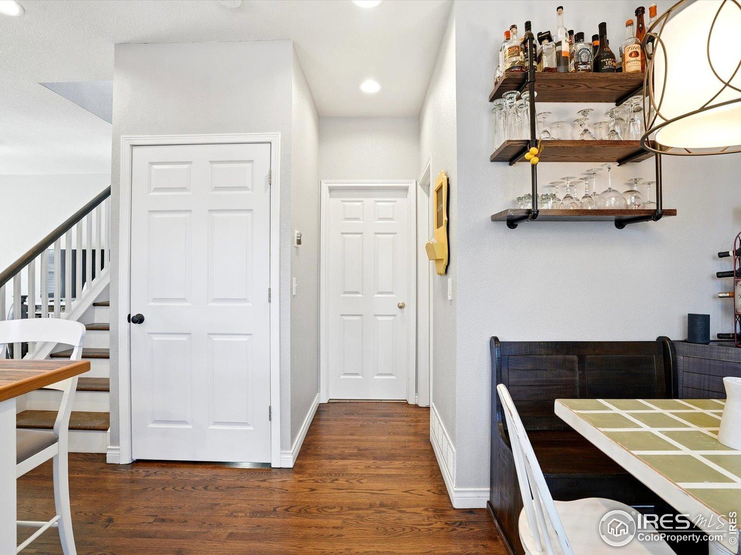 2139 Springs Place Longmont, CO 80504 - Photo 20 of 50 a view of wooden floor and windows in a kitchen