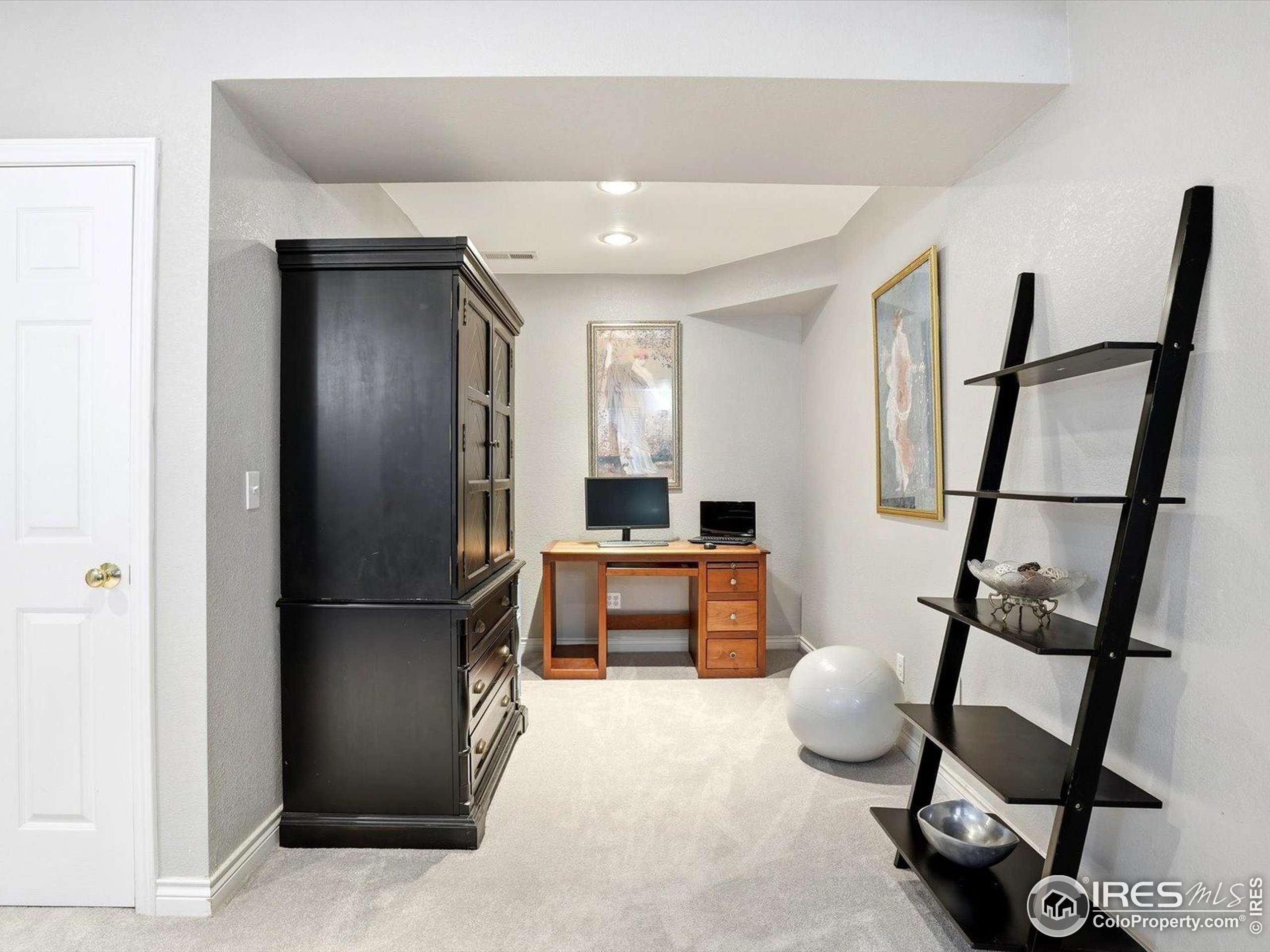 2139 Springs Place Longmont, CO 80504 - Photo 26 of 50 a kitchen with a refrigerator and a stove