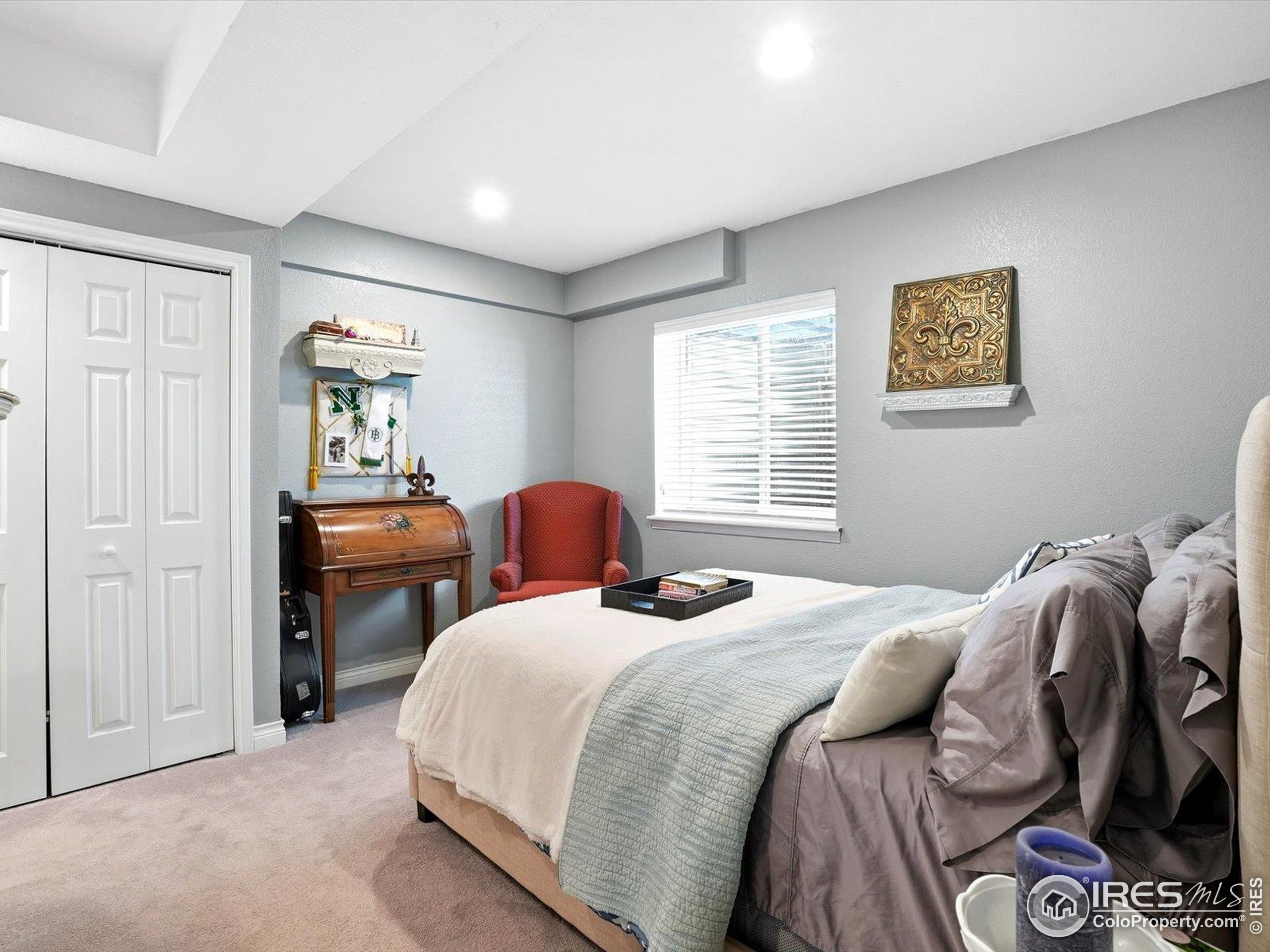 2139 Springs Place Longmont, CO 80504 - Photo 27 of 50 a bed room with a bed and a window