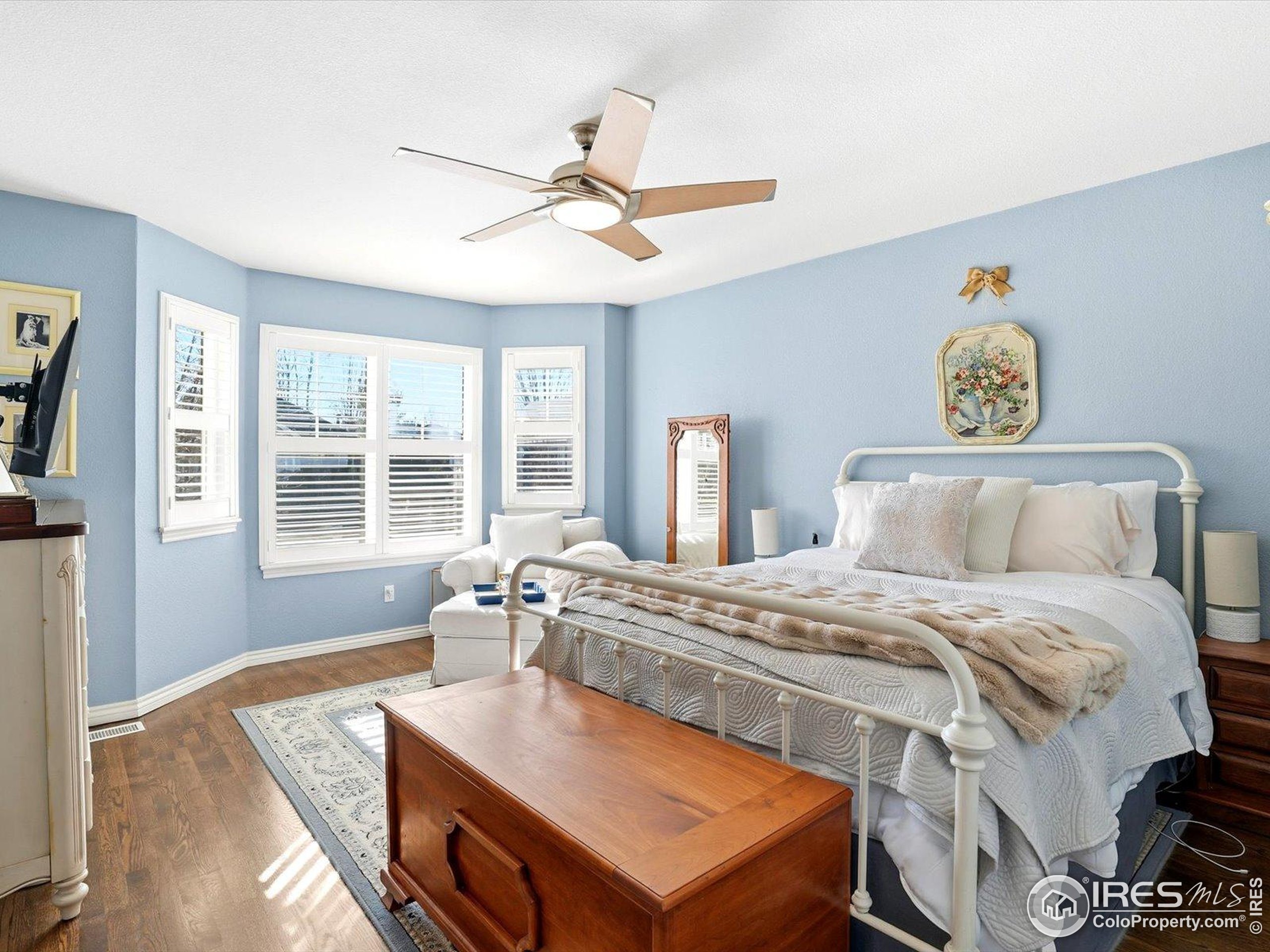 2139 Springs Place Longmont, CO 80504 - Photo 37 of 50 a bedroom with a bed and window