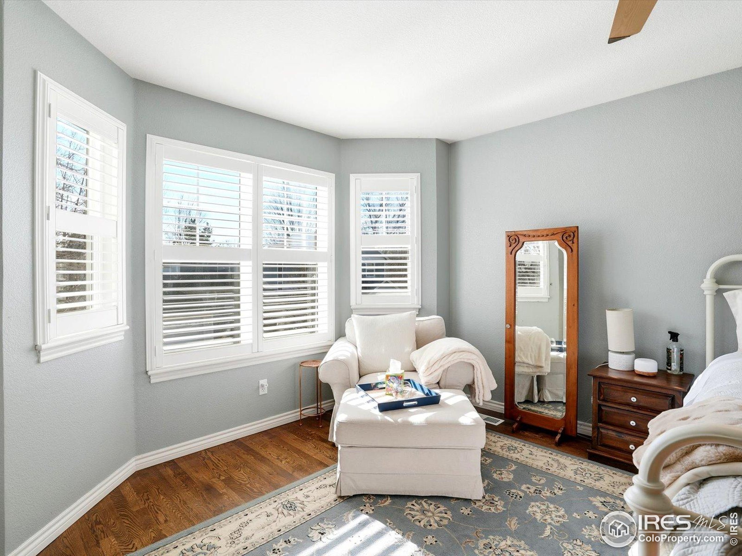 2139 Springs Place Longmont, CO 80504 - Photo 38 of 50 a living room with furniture and a large window