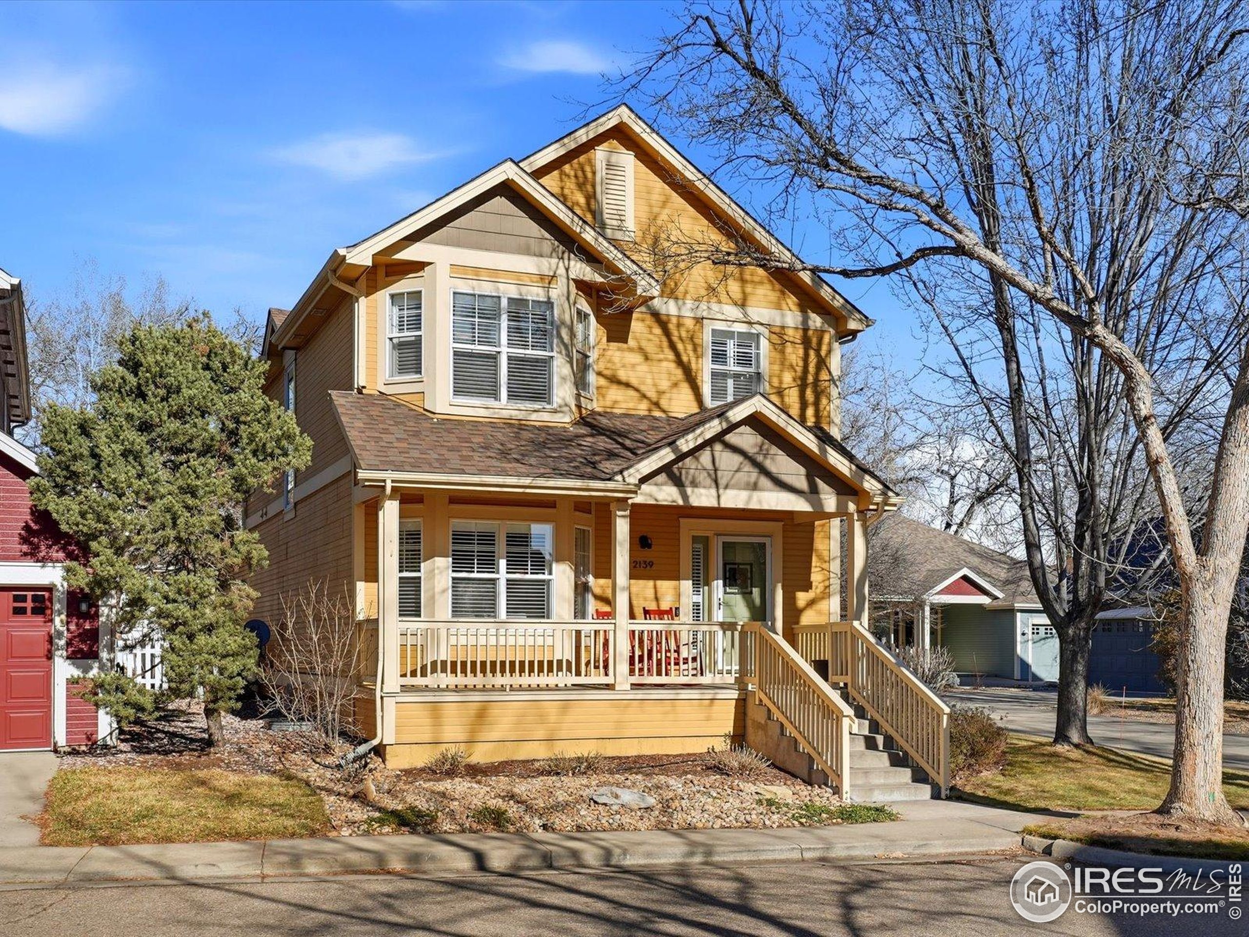 2139 Springs Place Longmont, CO 80504 - Photo 4 of 50 a front view of a house