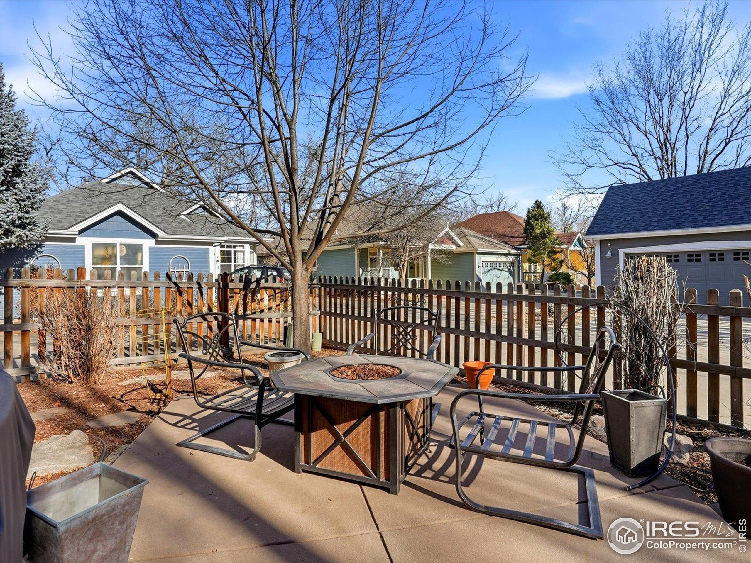 2139 Springs Place Longmont, CO 80504 - Photo 45 of 50 a view of a chairs and table in the patio