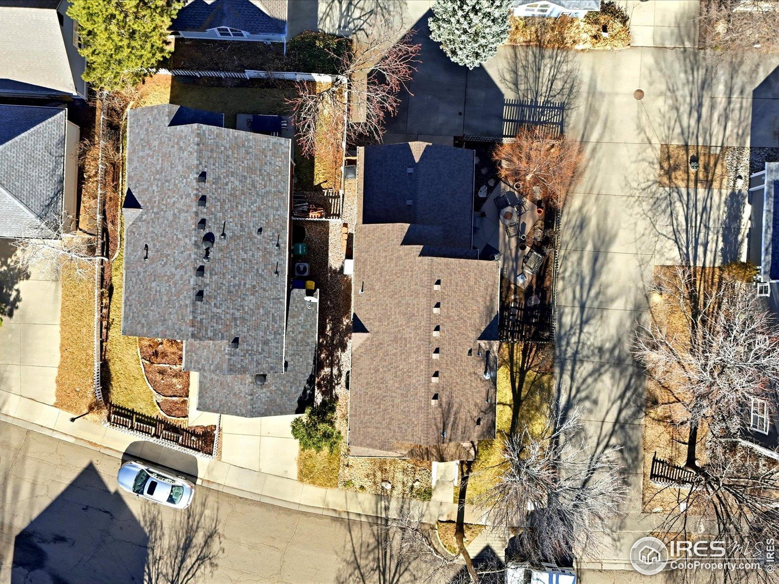 2139 Springs Place Longmont, CO 80504 - Photo 48 of 50 front view of a house with a yard