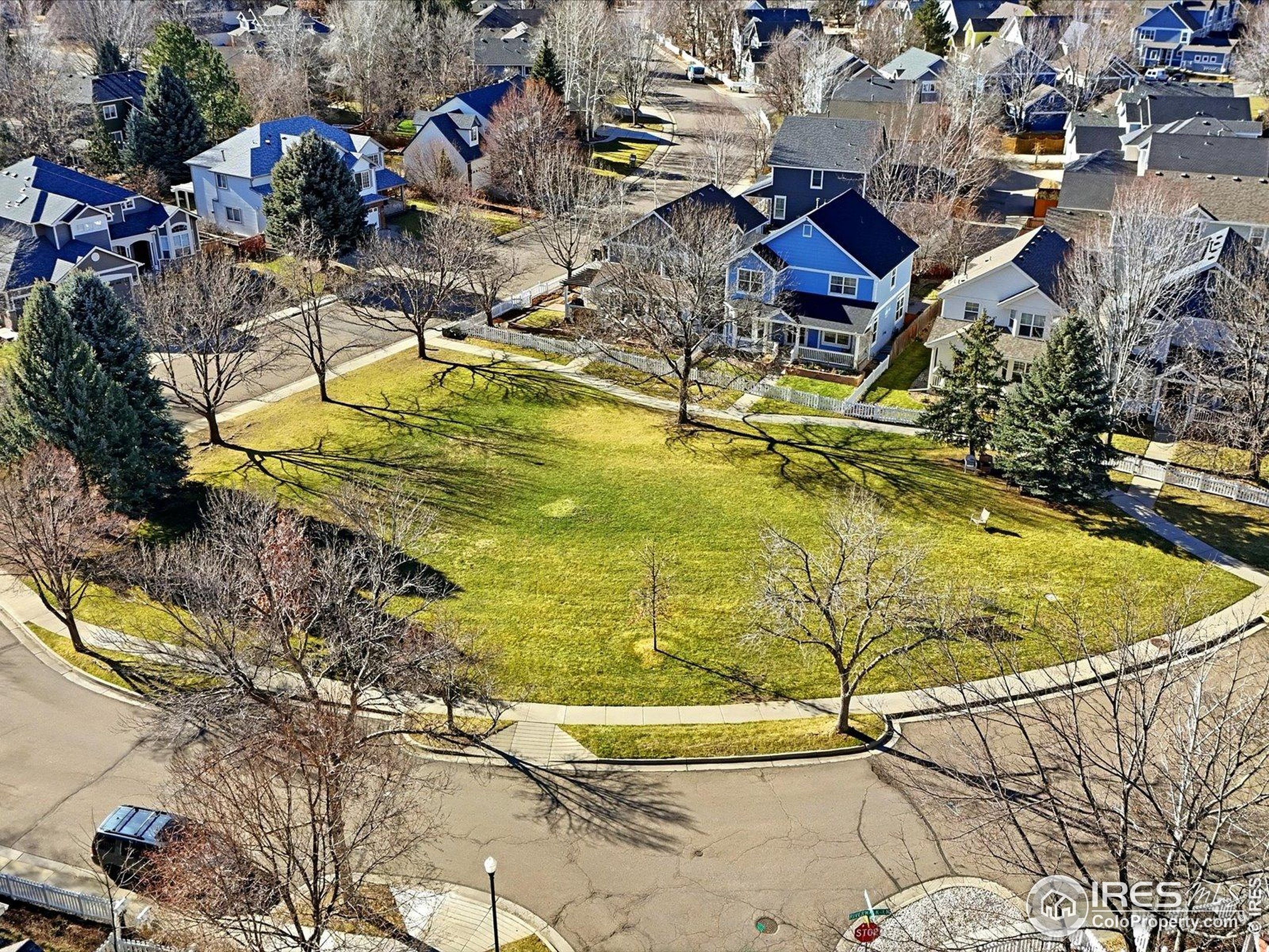 2139 Springs Place Longmont, CO 80504 - Photo 50 of 50 a view of swimming pool with a yard and seating area