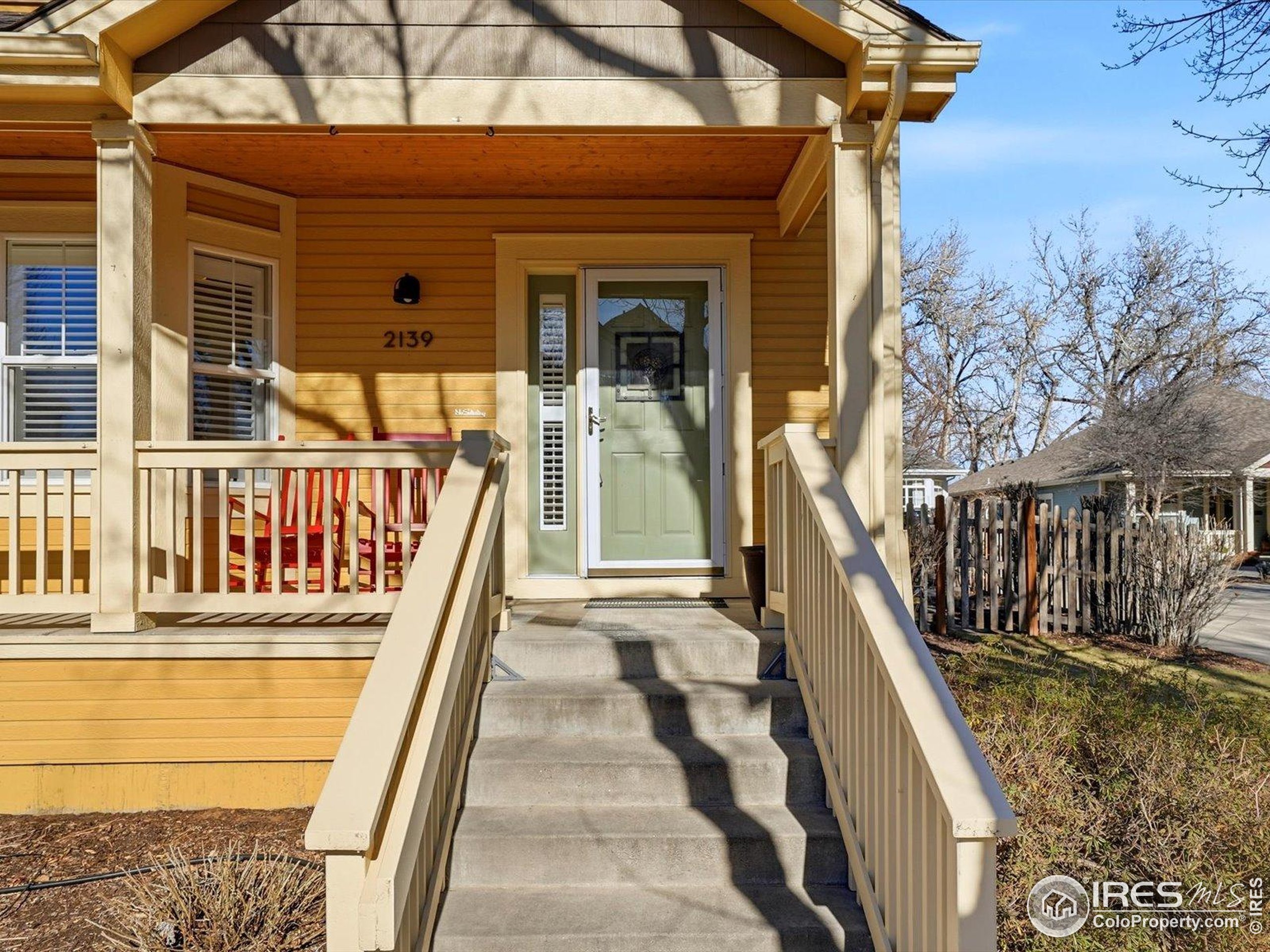 2139 Springs Place Longmont, CO 80504 - Photo 5 of 50 a view of a house with wooden stairs