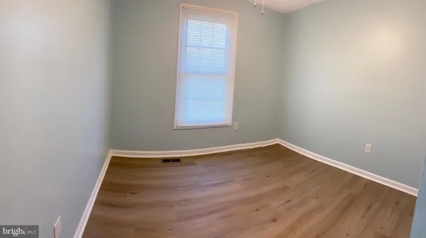 a bathroom with a sink toilet and vanity