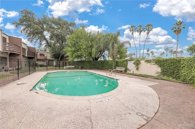 a view of outdoor space and swimming pool