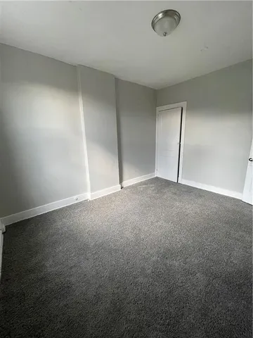 an empty room with a natural light